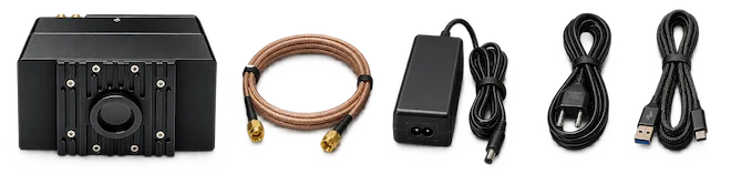 In the box from left to right: PhotonPix detector, SMA cable, power supplier, power supplier cable, USB A-C cable.